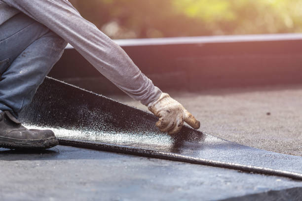 Professional Emergency Waterproofing technician working in Carle Place, NY